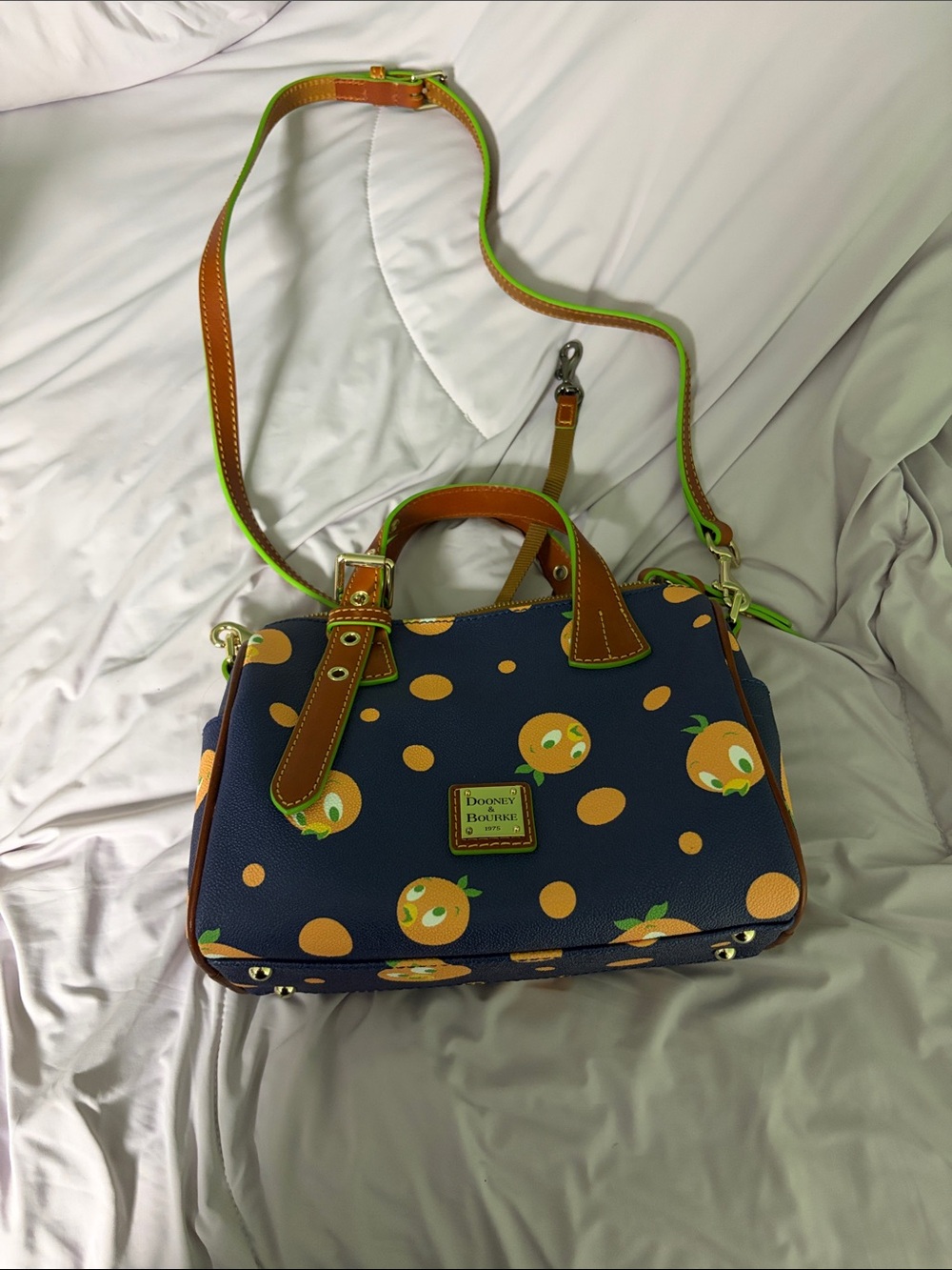 Dooney & Bourke Navy Satchel with Orange Fruit Print and Brown Trim
